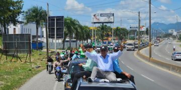 FP realiza en Los Alcarrizos y Pedro Brand su tercera marcha en protesta por el robo de las EDES
