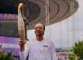 Rapero Snoop Dogg porta la antorcha en la ceremonia inaugural de Paris 2024