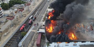 Sistema 911 coordina asistencia de incendio en zona franca de Rafey