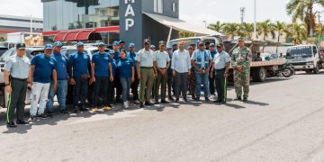 Alcaldía del DN y DIGESETT retiran chatarras y vehículos mal estacionados en Ensanche Quisqueya