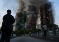 Los muertos por el incendio de Hong Kong ascienden a 128 y otras 200 personas siguen desaparecidas