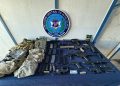 DINTEL y Ministerio Público ocupan pistola, réplicas de fusiles y pertrechos durante allanamiento en Santiago